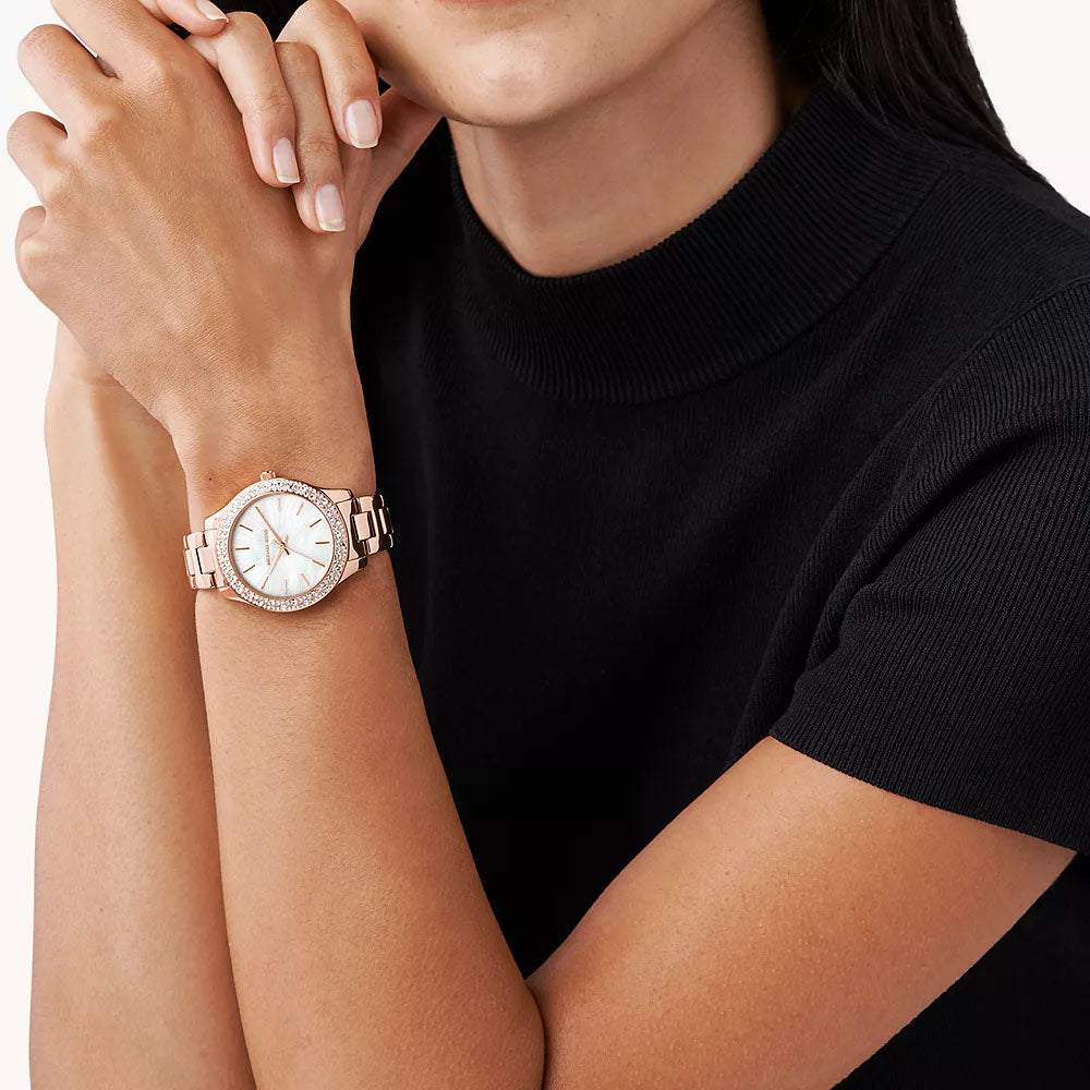 Michael Kors Mother of Pearl Analog Women's Watch Gold Plated Metal Bracelet - MK4557