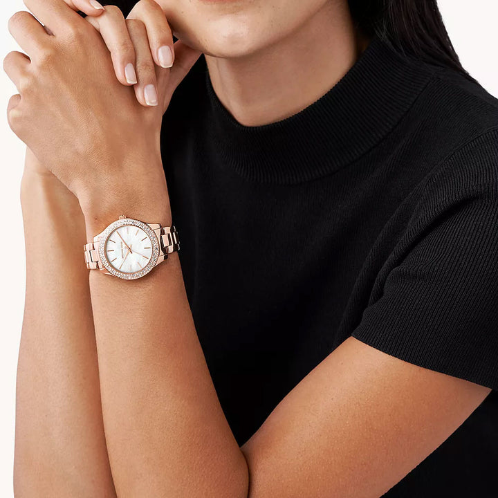 Michael Kors Mother of Pearl Analog Women's Watch Gold Plated Metal Bracelet - MK4557