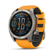 Garmin Fenix 8 - 51 مم، شاشة Amoled، زجاج ياقوتي (Sapphire) مع إطار تيتانيوم وسوار سيليكون باللون البرتقالي المتوهج والرمادي الداكن