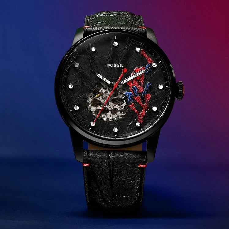 Tonal black webbing draped across the crystal and leather strap