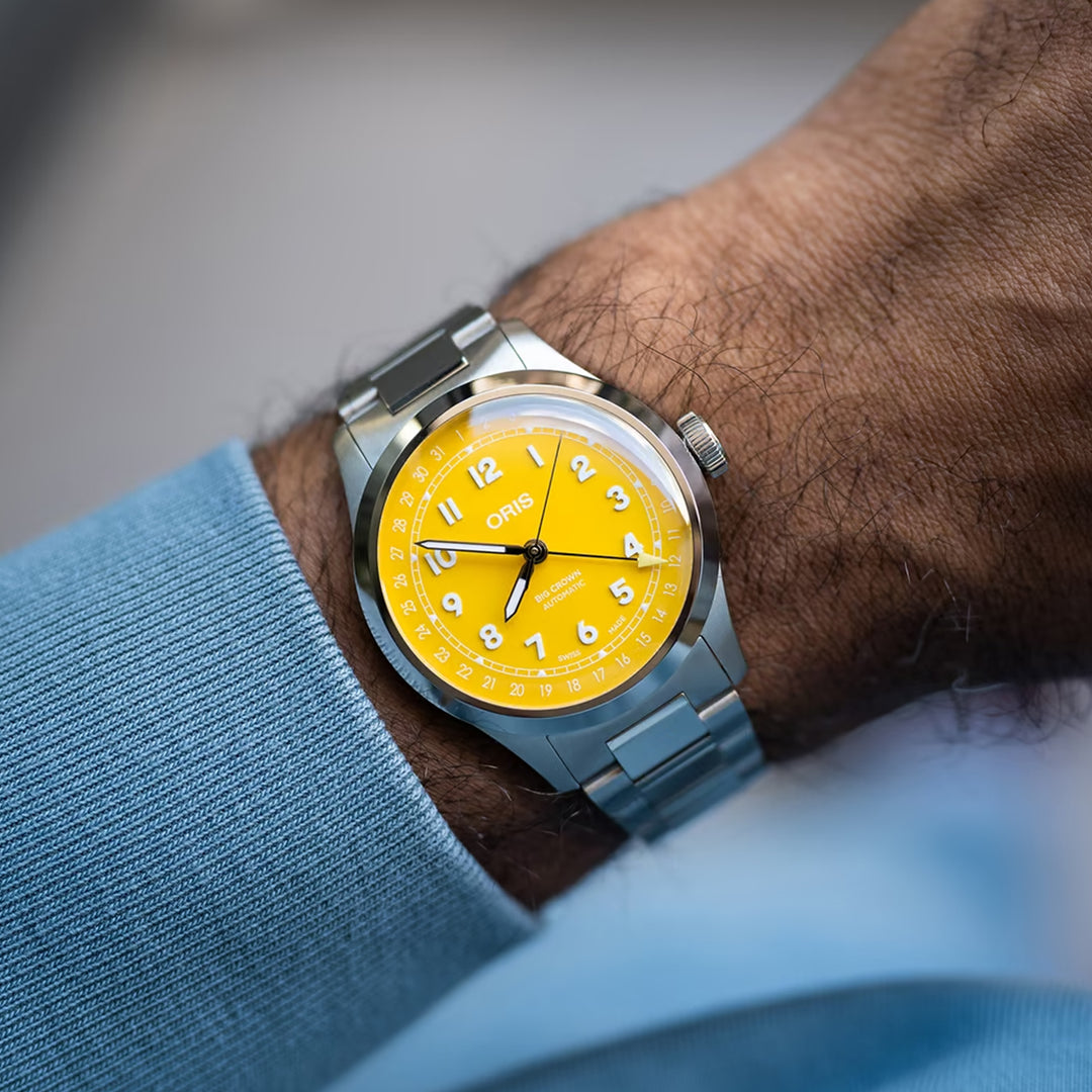 Oris Men's Silver Tone Case Yellow Dial Automatic Watch