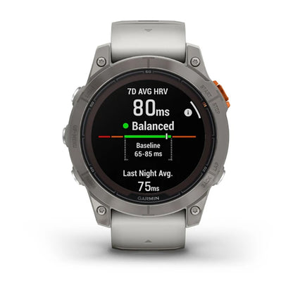 ساعة Garmin Fenix 7 Pro Sapphire Solar Edition من التيتانيوم باللون الرمادي الضبابي/البرتقالي الجمر بملء الشاشة
